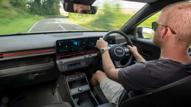 Auto Express chief reviewer Alex Ingram driving the Hyundai Kona